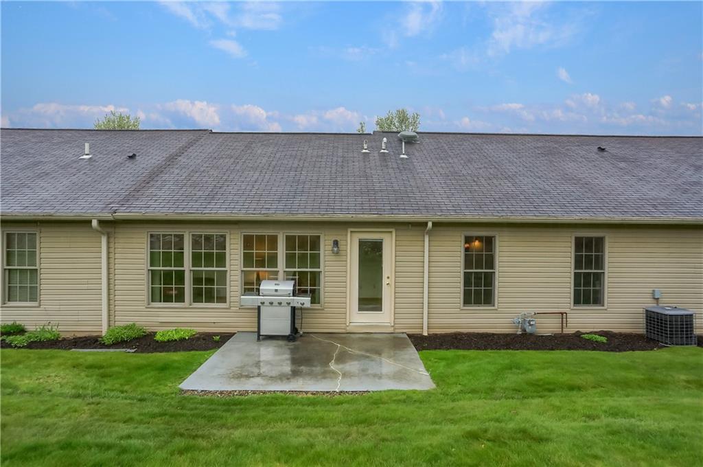 119 South Butler Street Saxonburg, PA 16056 - Photo 34 of 39 a front view of a house with a yard and outdoor seating