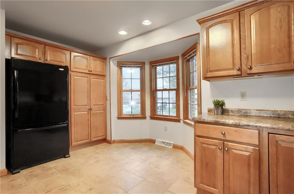 119 South Butler Street Saxonburg, PA 16056 - Photo 9 of 39 a kitchen with granite countertop stainless steel appliances a refrigerator and cabinets