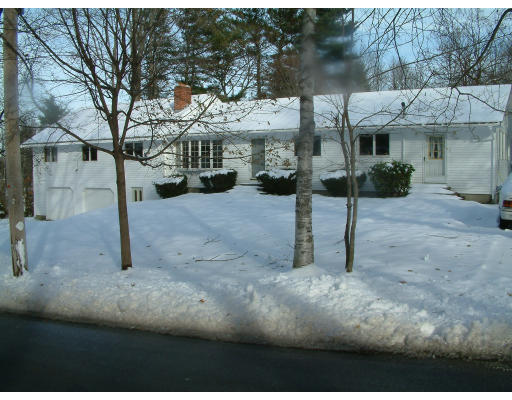 7 Boutwell Road Andover, MA 01810 - Photo 1 of 1 a view of a house with a yard