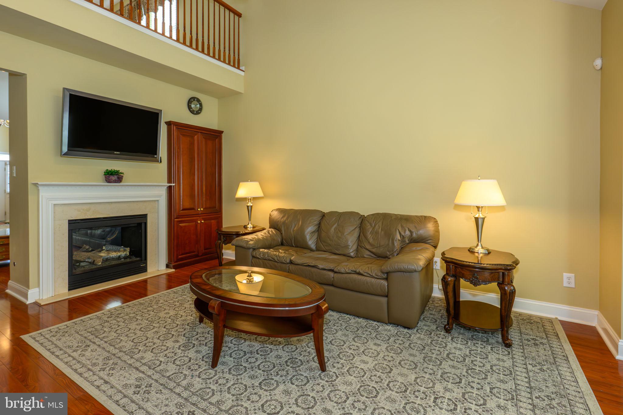2040 Kingsview Road Macungie, PA 18062 - Photo 8 of 39 Family room with double gas fireplace