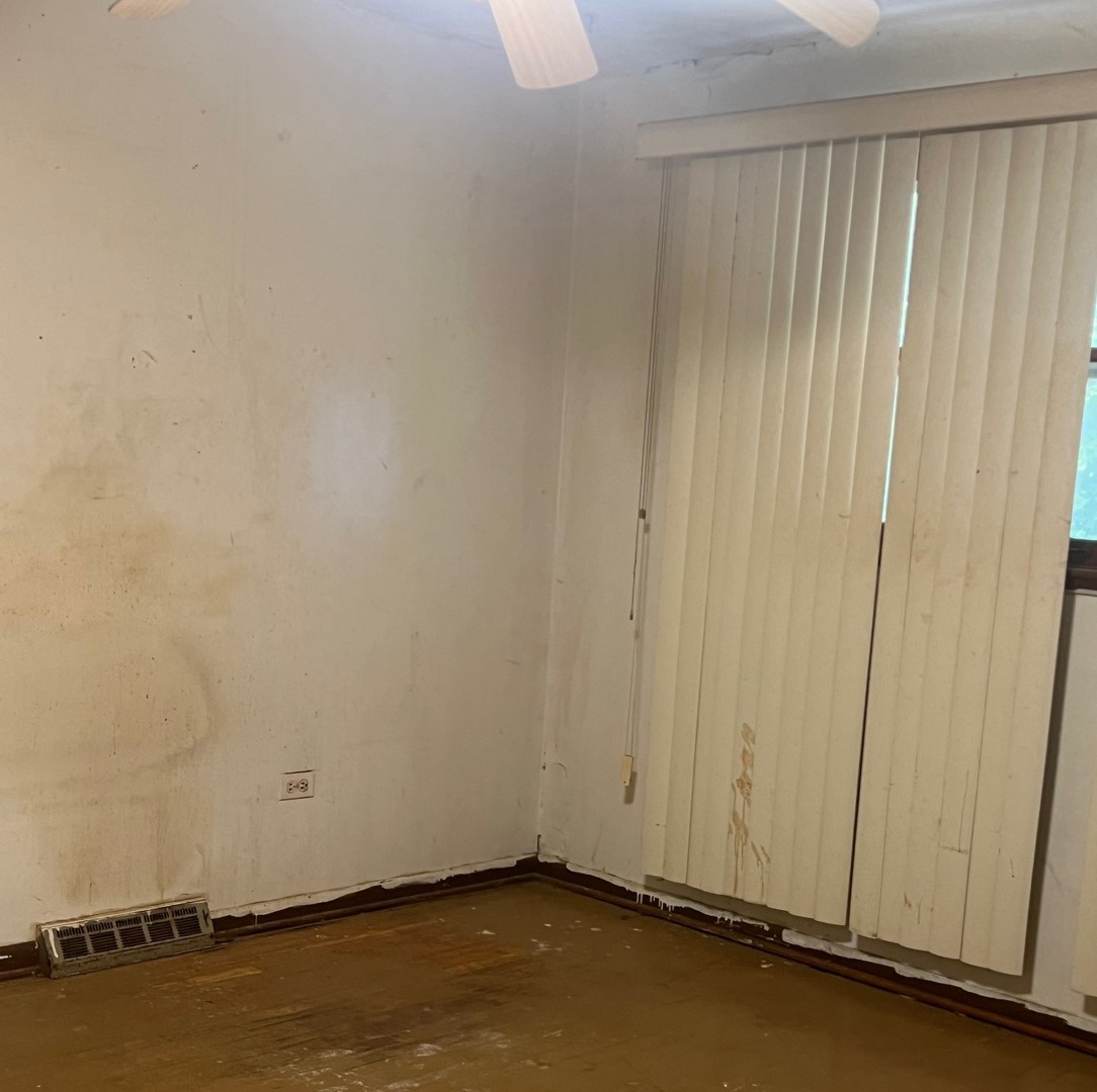 14425 Vail Avenue Harvey, IL 60426 - Photo 11 of 16 a view of an empty room and wooden floor