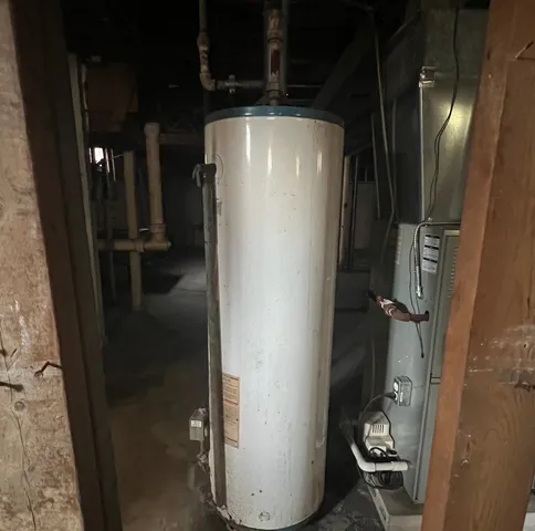 a bathroom with a shower and a sink