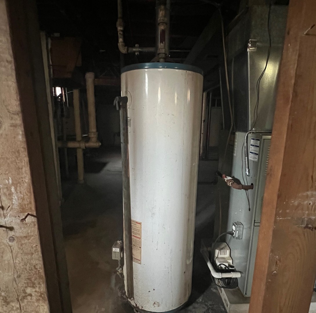 14425 Vail Avenue Harvey, IL 60426 - Photo 15 of 16 a bathroom with a shower and a sink