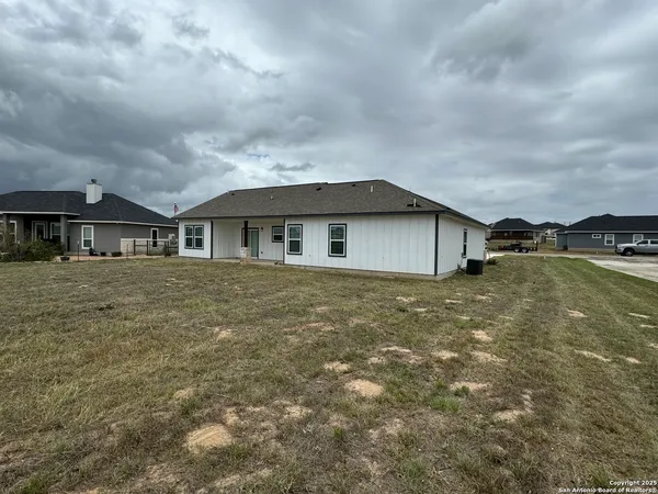 a house with river in front of it