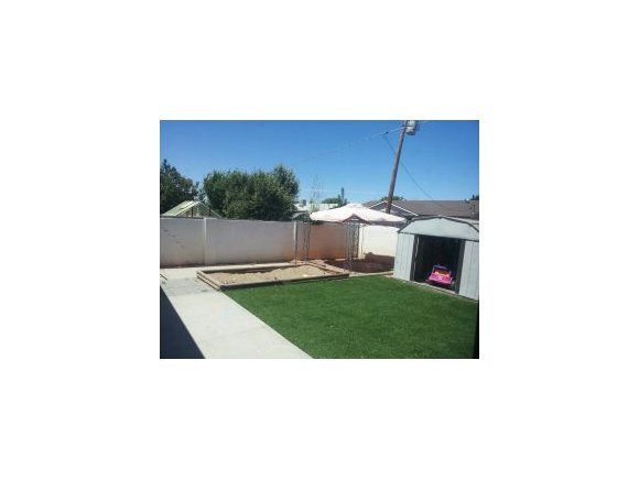 3211 North Victor Road Prescott Valley, AZ 86314 - Photo 5 of 5 a picture of a bench in a backyard