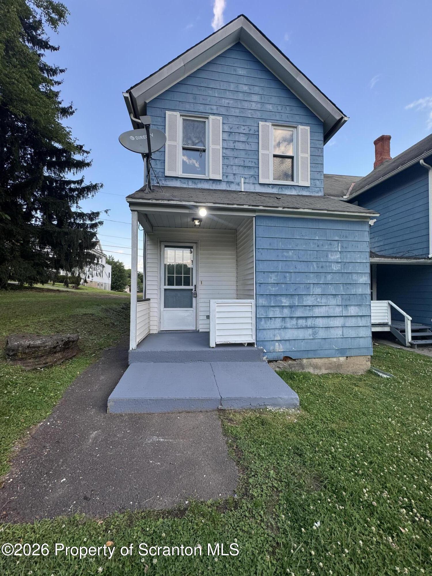 233 Reese Street Scranton, PA 18508 - Photo 21 of 22 a front view of a house with a yard
