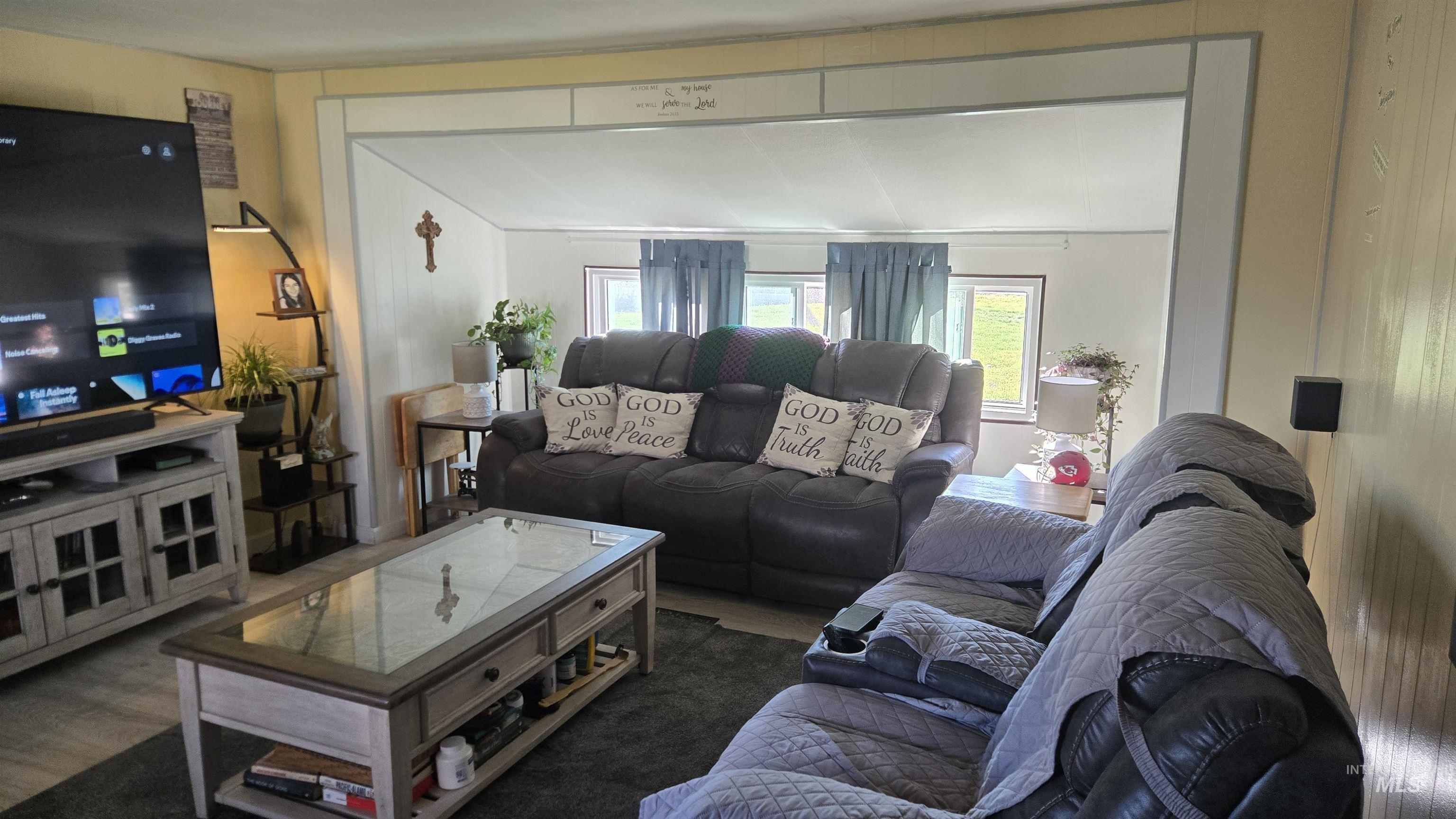 798 Dolson Lane Eagle, ID 83616 - Photo 13 of 33 Living area with wood finished floors
