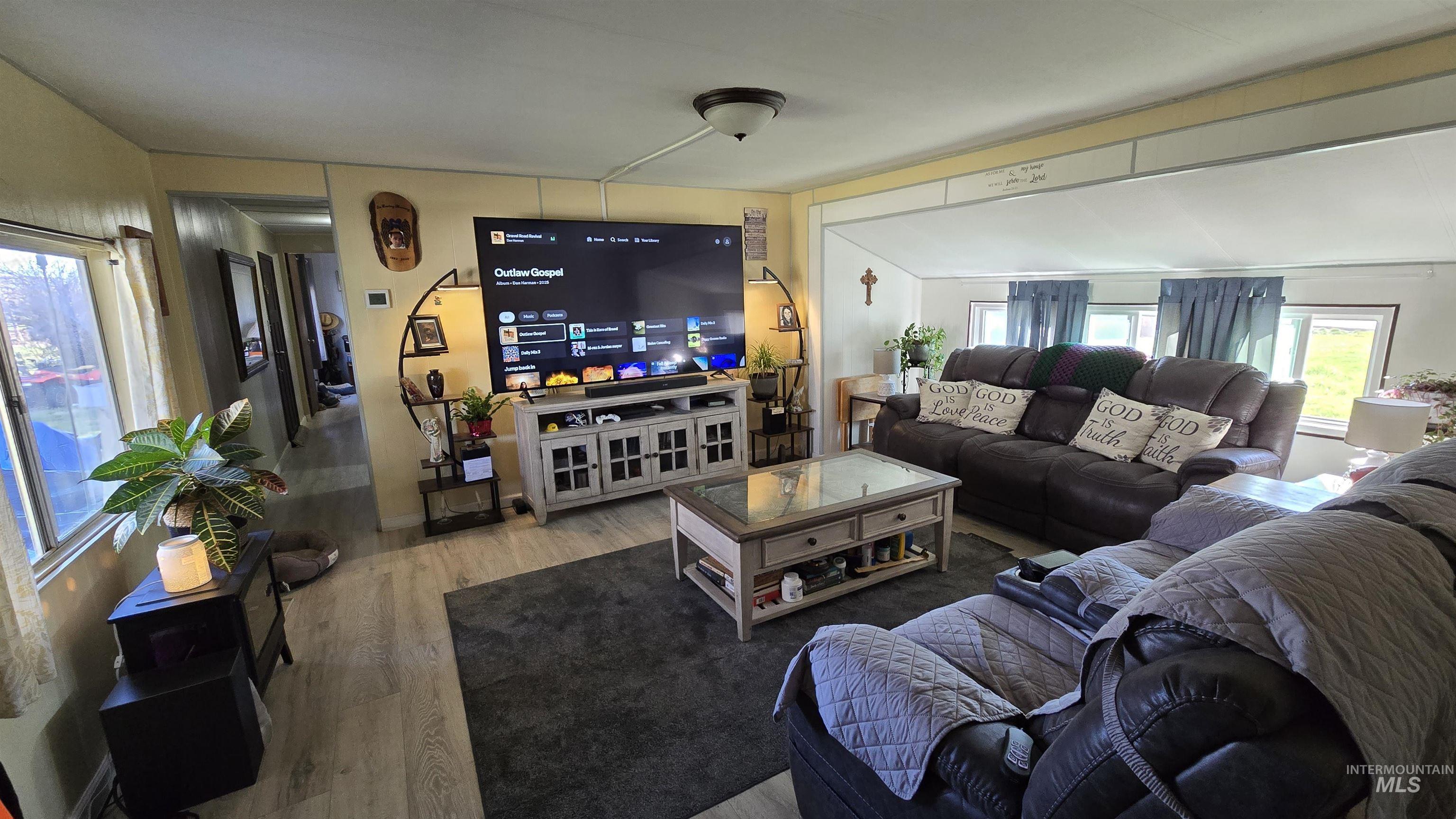 798 Dolson Lane Eagle, ID 83616 - Photo 2 of 33 Living area featuring light wood finished floors