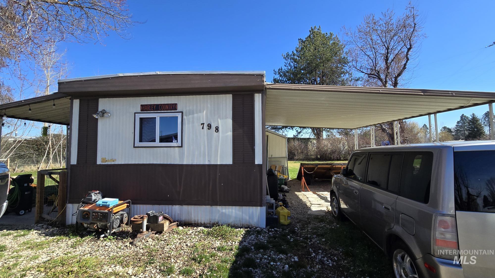 798 Dolson Lane Eagle, ID 83616 - Photo 30 of 33 View of property exterior with an attached carport