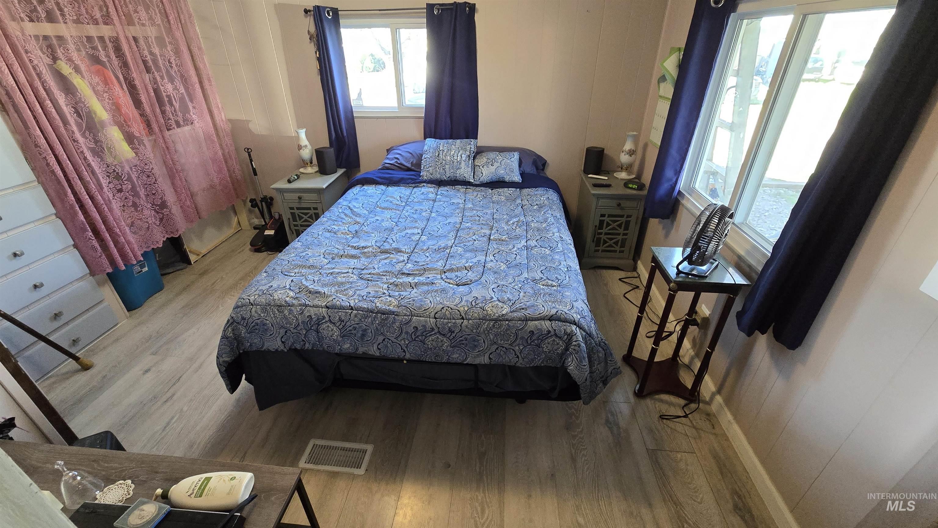 798 Dolson Lane Eagle, ID 83616 - Photo 8 of 33 Bedroom with light wood-style floors