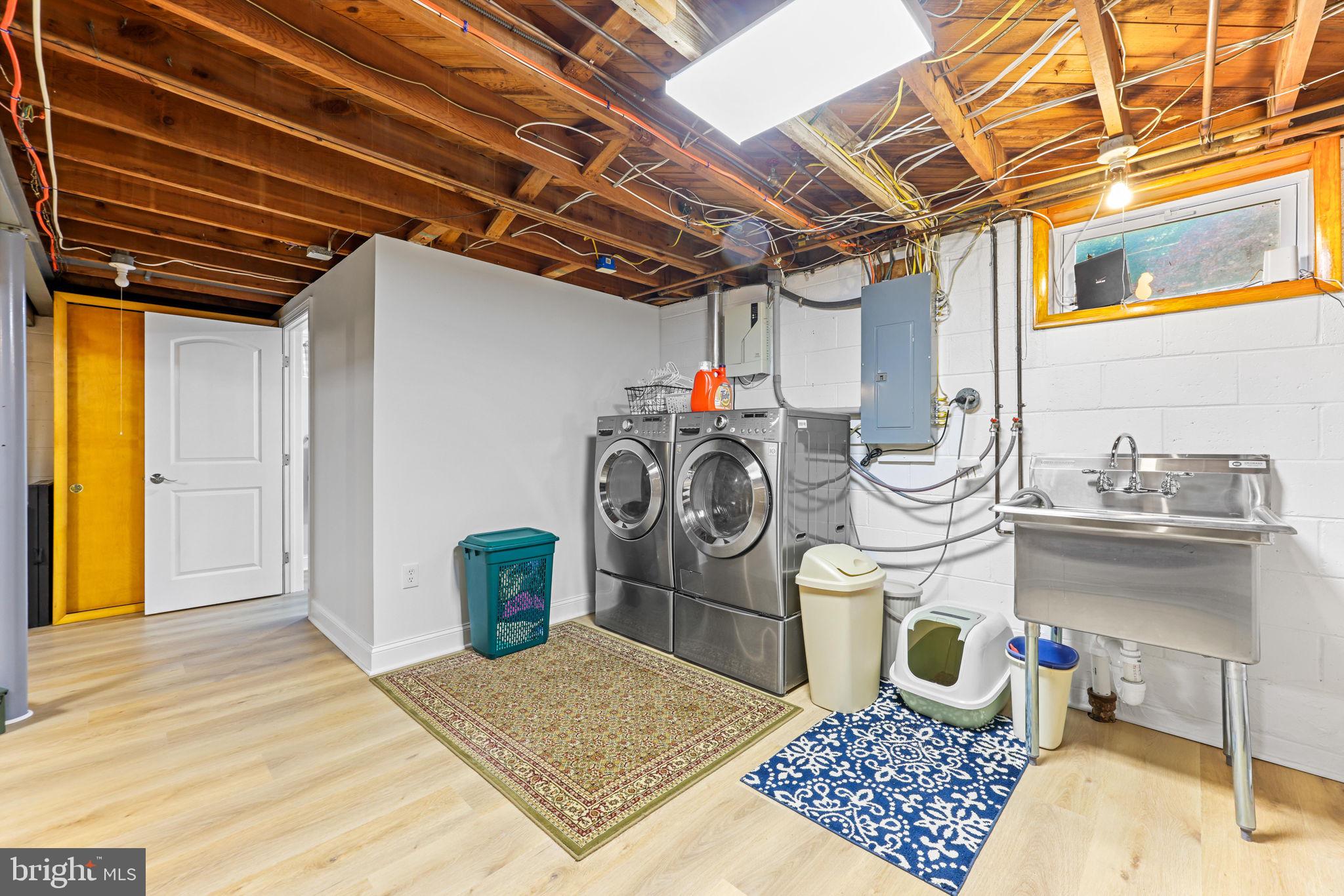 2902 Ritchie Avenue Baltimore, MD 21219 - Photo 36 of 43 a storage room with lots of appliances