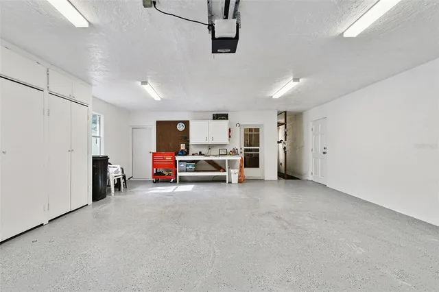 a view of a livingroom with furniture and white walls