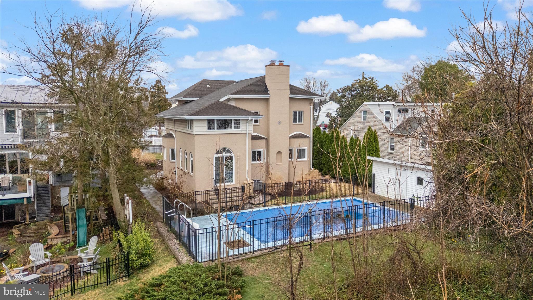 a aerial view of a house with a yard