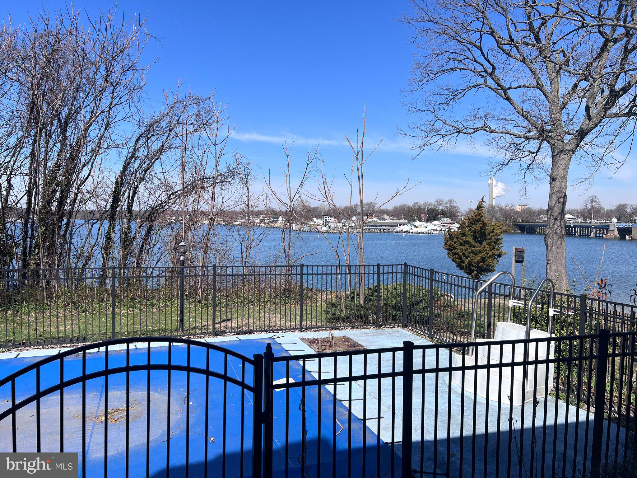 20 Granada Road Pasadena, MD 21122 - Photo 2 of 9 Serene lakeside retreat awaits you.