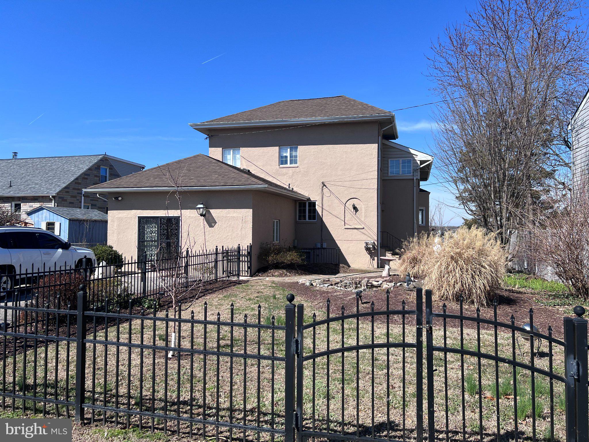 20 Granada Road Pasadena, MD 21122 - Photo 8 of 9 Charming home with inviting garden.