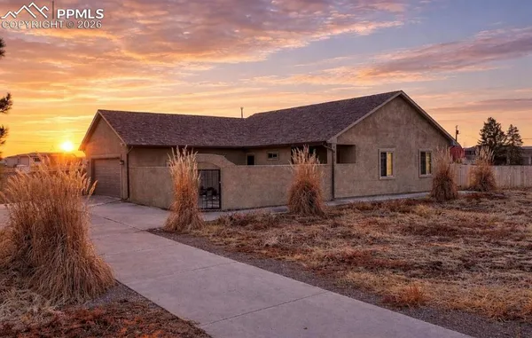 a house view with a backyard space