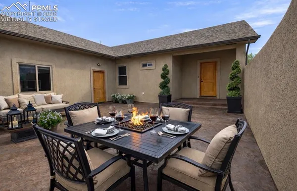a view of a outdoor seating area with furniture