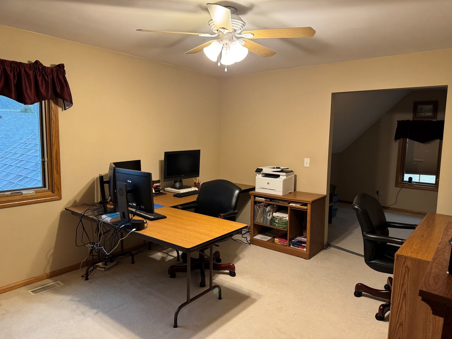 1397 O'Connell Circle New Lenox, IL 60451 - Photo 17 of 23 a view of a workspace with furniture and a window