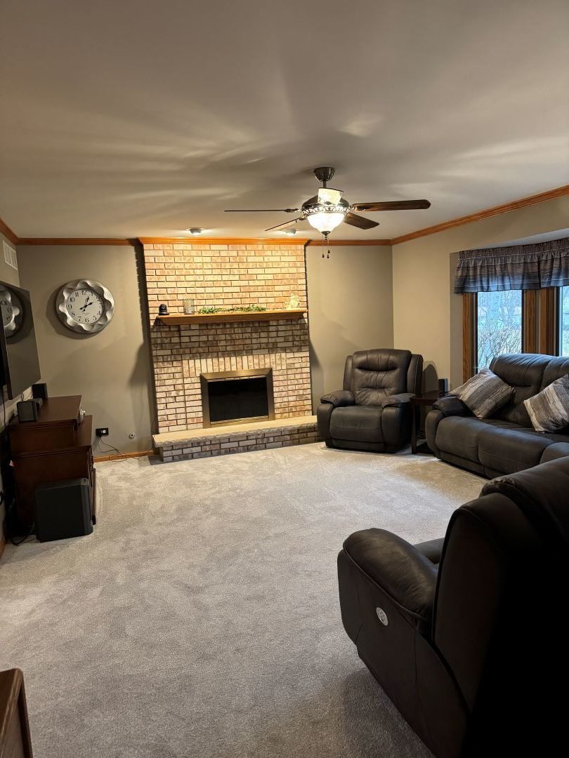 1397 O'Connell Circle New Lenox, IL 60451 - Photo 7 of 23 a living room with furniture and a fireplace