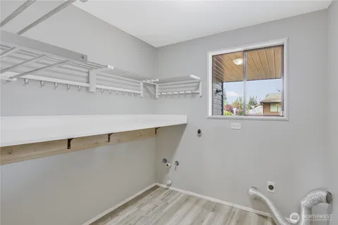 a view of a room with racks on the wall