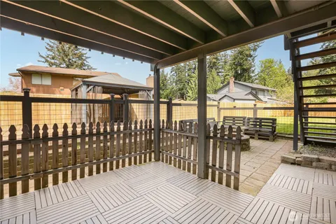 a balcony with wooden floor