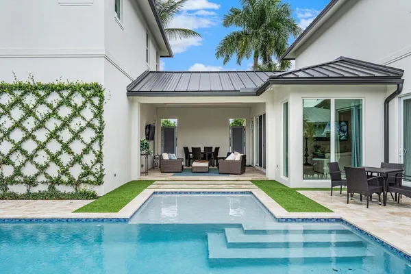 a view of an house with swimming pool