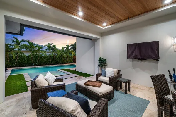 a front view of house with a garden