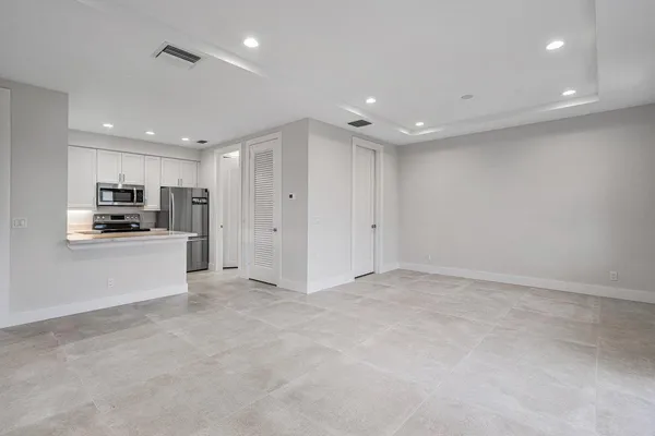 a view of swimming pool with seating area