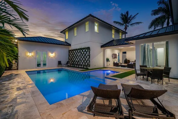 an aerial view of a house with a garden