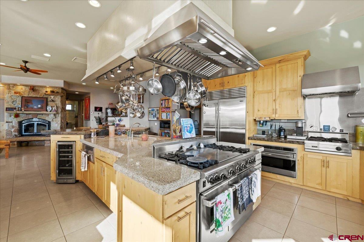 15773 6000th Road Montrose, CO 81403 - Photo 11 of 35 a kitchen with kitchen island granite countertop lots of counter top space