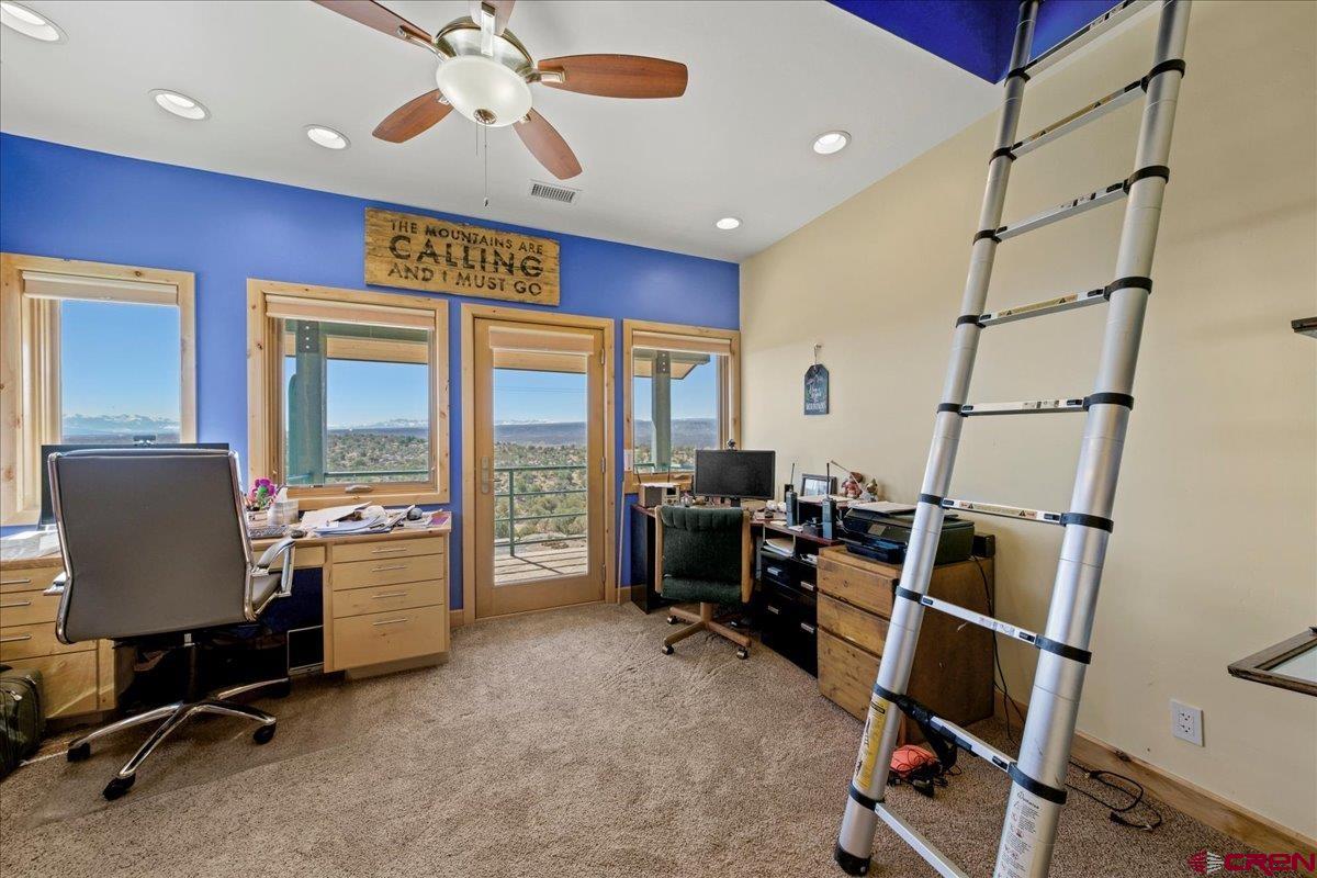 15773 6000th Road Montrose, CO 81403 - Photo 18 of 35 a view of workspace with furniture and windows
