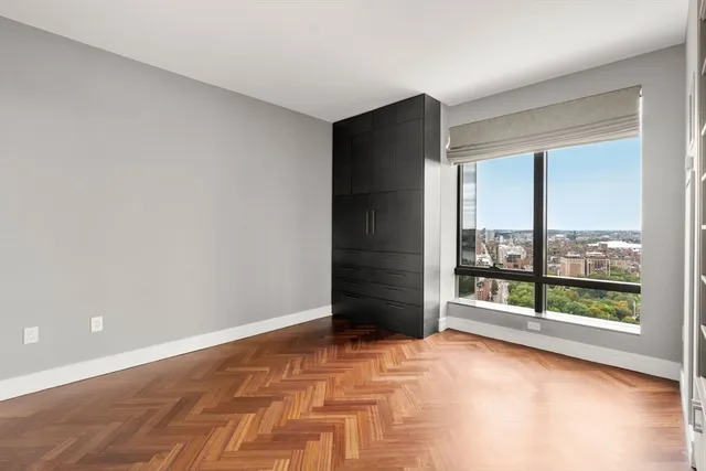 an empty room with sliding door