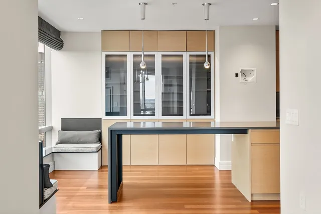 a living room with a furniture and a window