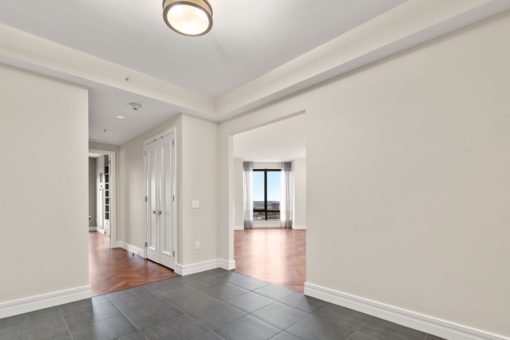 1 Avery Street, Unit 33A Boston, MA 02111 - Photo 10 of 29 wooden floor in a room