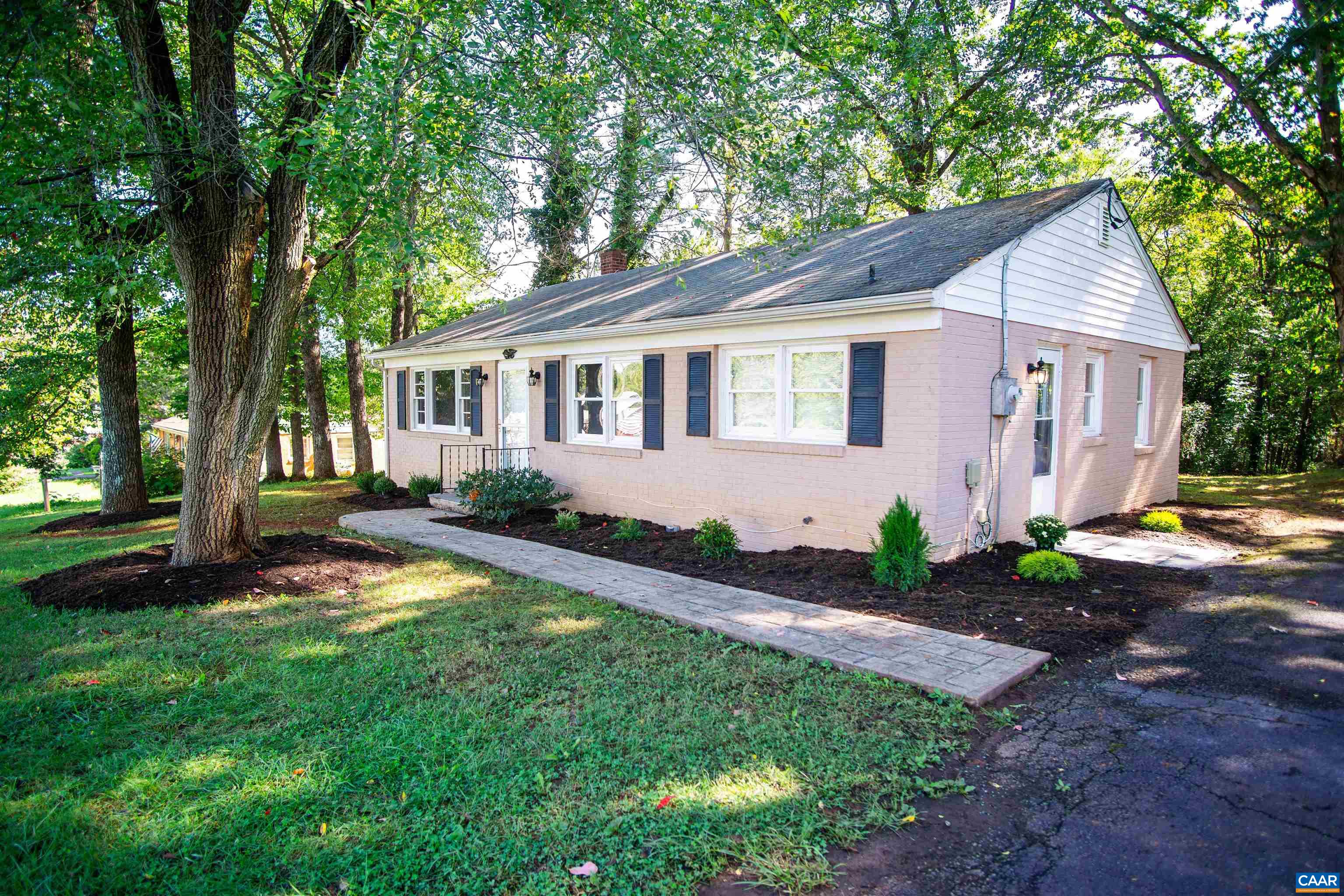 208 Locust Lane Ruckersville, VA 22968 - Photo 1 of 24 a view of a house with backyard and trees