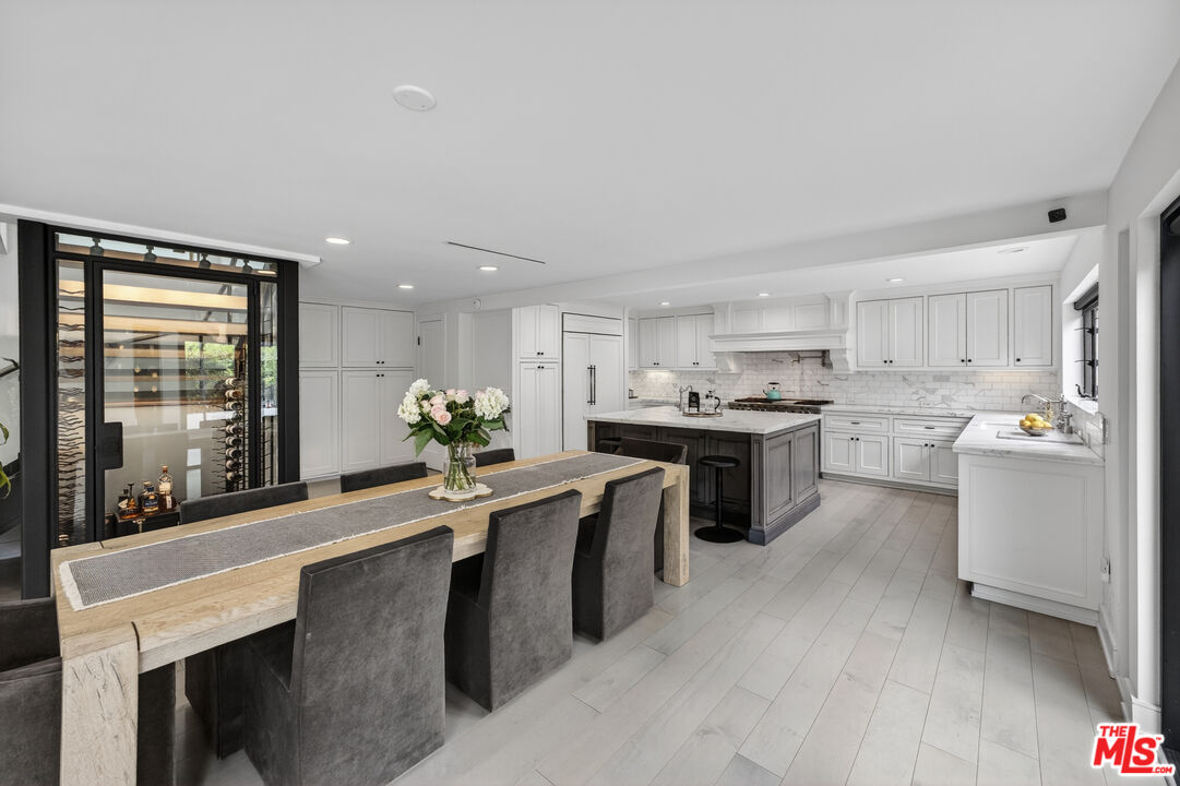 760 South San Rafael Avenue Pasadena, CA 91105 - Photo 21 of 45 a kitchen with kitchen island a sink counter top space and stainless steel appliances