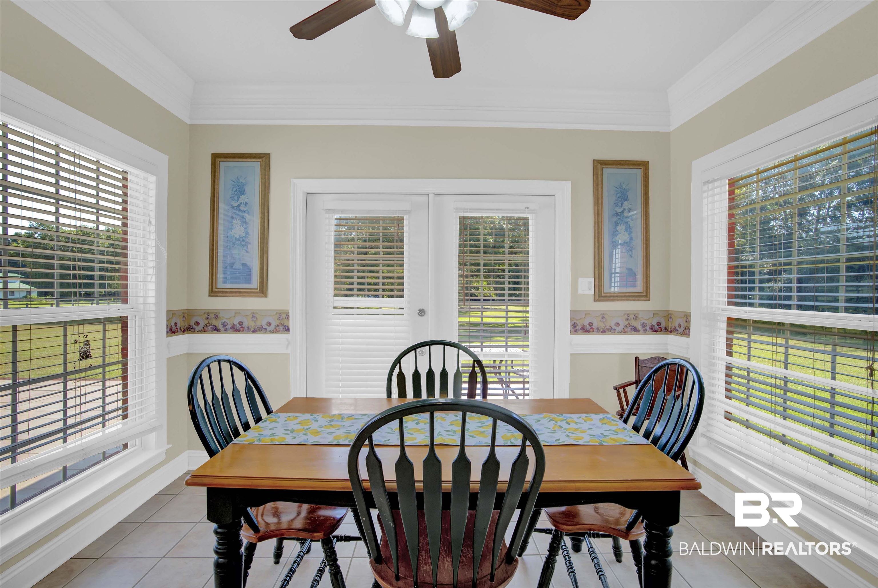 27688 Rigsby Road Daphne, AL 36526 - Photo 21 of 56 Dining space with ceiling fan, light tile patterned flooring, and plenty of natural light