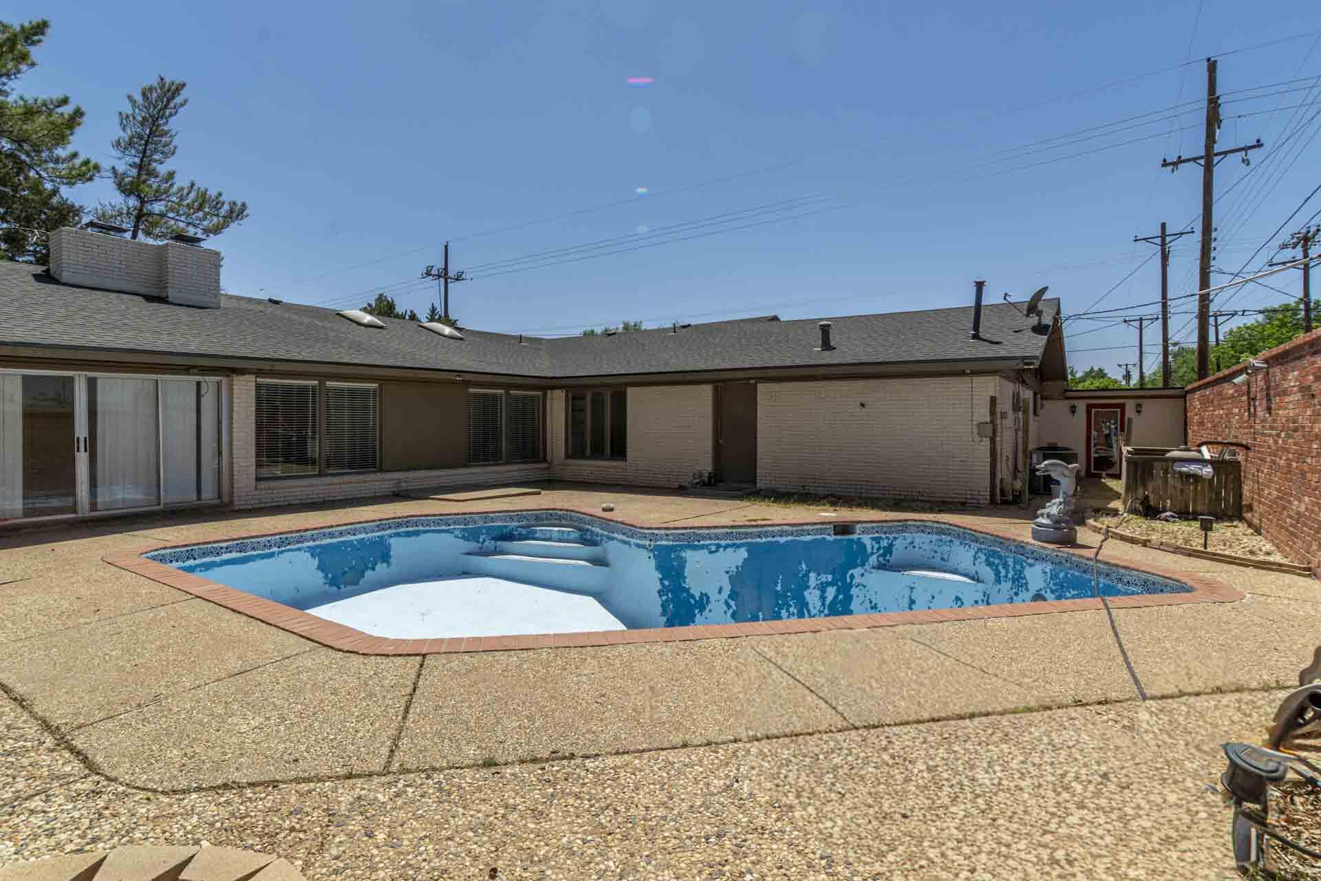2136 57th Street Lubbock, TX 79412 - Photo 31 of 41 a view of a house with swimming pool