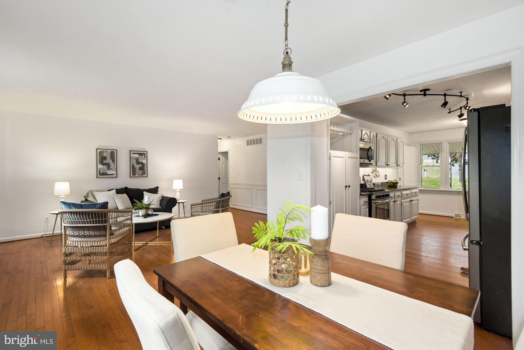 2120 Round Hill Road Fallston, MD 21047 - Photo 7 of 24 a living room with furniture and a chandelier