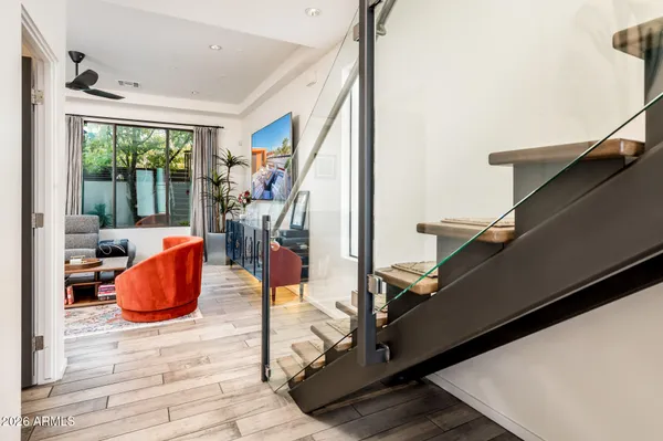 a living room with furniture and a rug
