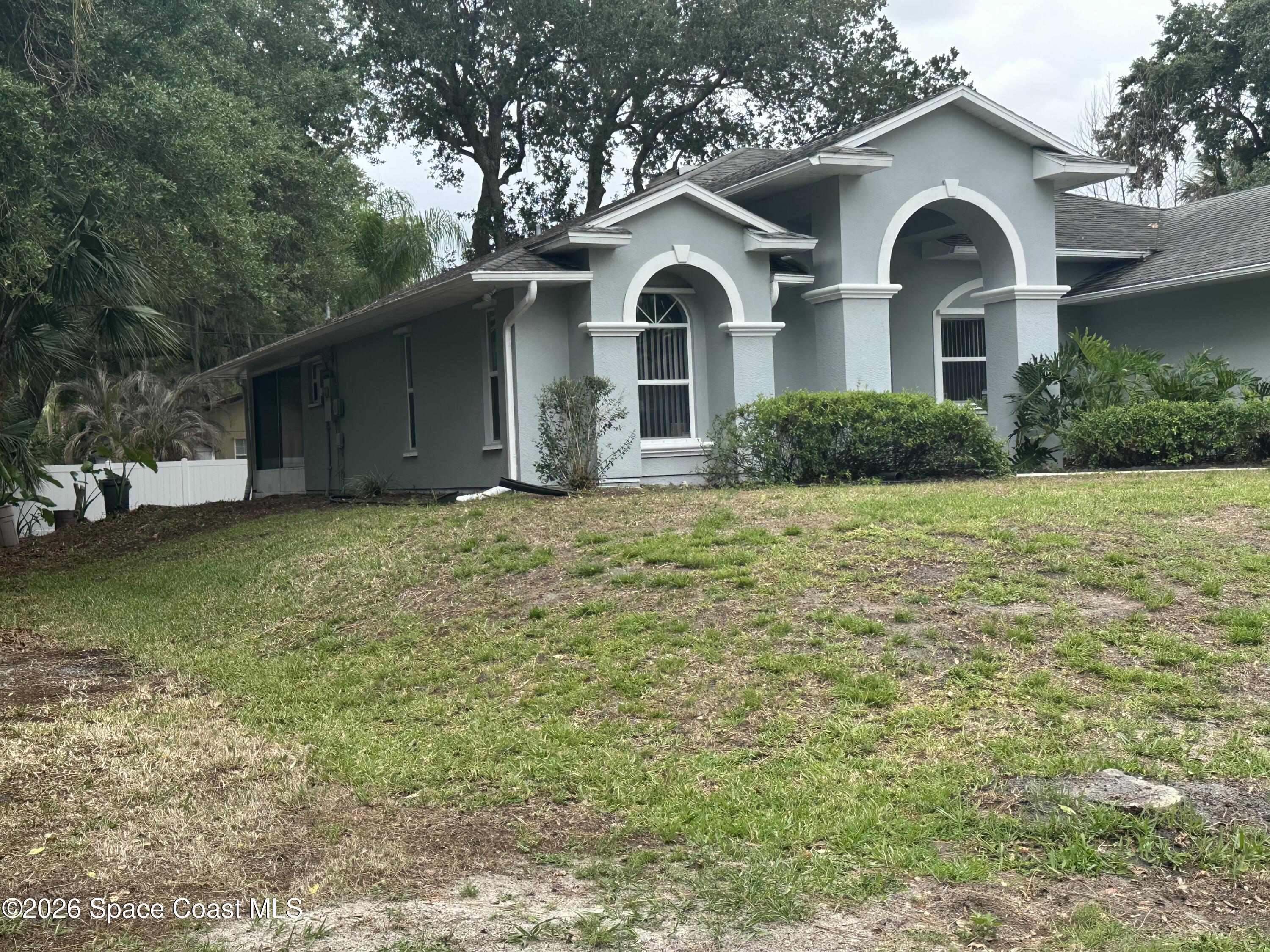 632 Bayfront Terrace Sebastian, FL 32958 - Photo 2 of 24 side and rv area