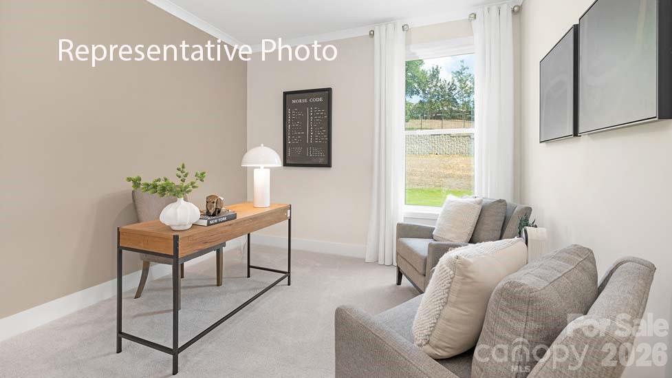 3040 Canvasback Way Indian Trail, NC 28079 - Photo 22 of 27 a living room with furniture and a window