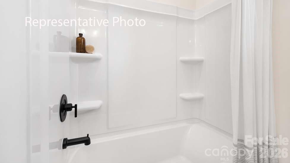 3040 Canvasback Way Indian Trail, NC 28079 - Photo 26 of 27 a bathroom with a shower