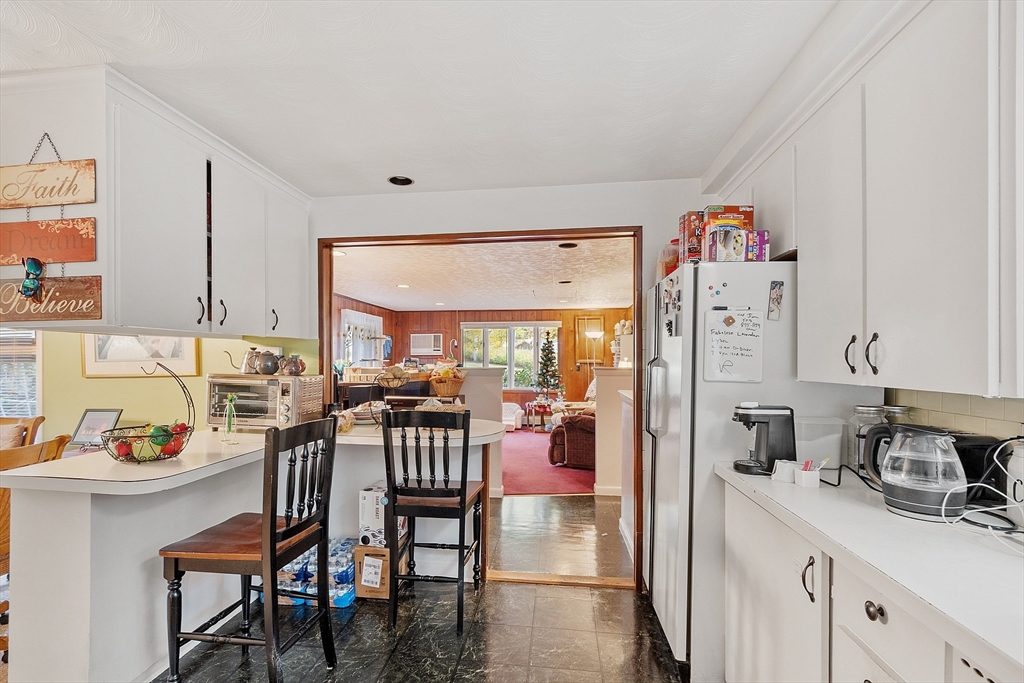 36 Brownlea Road Framingham, MA 01701 - Photo 13 of 24 a view of a dining room with furniture window and outside view