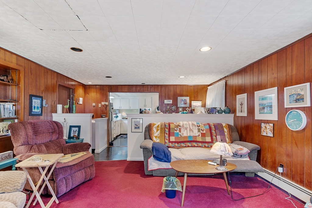 36 Brownlea Road Framingham, MA 01701 - Photo 17 of 24 a living room with furniture and a painting