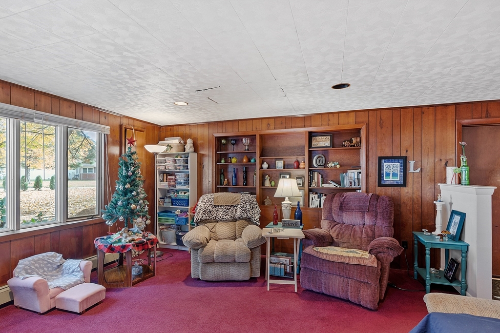 36 Brownlea Road Framingham, MA 01701 - Photo 18 of 24 a living room with furniture and a large window