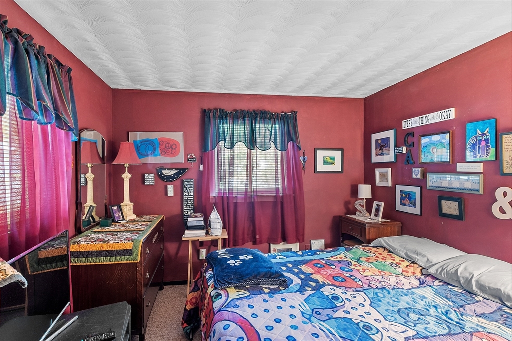 36 Brownlea Road Framingham, MA 01701 - Photo 20 of 24 a bedroom with furniture and a closet