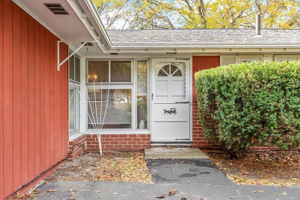36 Brownlea Road Framingham, MA 01701 - Photo 2 of 24 a front view of a house with a yard