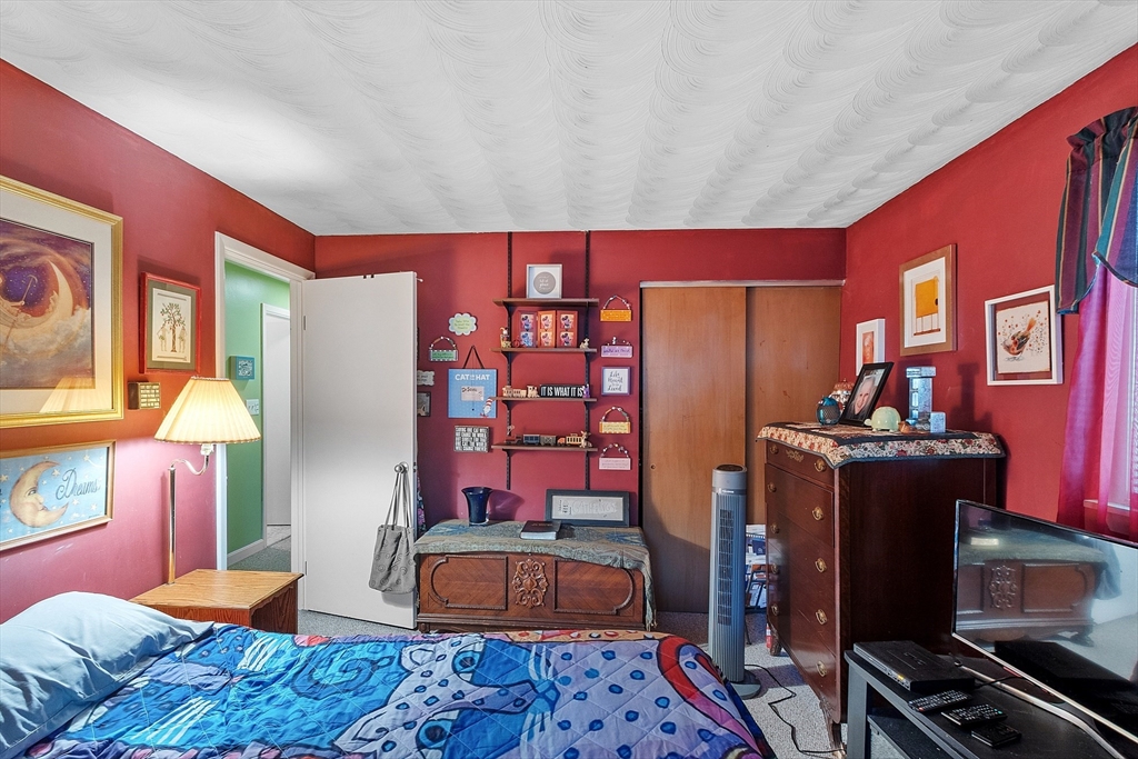 36 Brownlea Road Framingham, MA 01701 - Photo 21 of 24 a bedroom with furniture and wooden floor