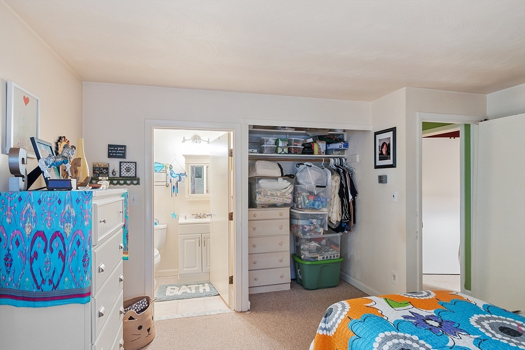 36 Brownlea Road Framingham, MA 01701 - Photo 23 of 24 a bedroom with a bed and a window